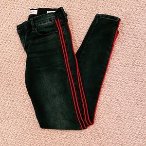 Black jean pants with 2 red stripes